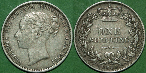 Victoria 1883 fourth young head shilling , toned with wear to the higher points. Grades better than very fine and the price is £40.