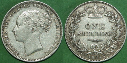 Victoria 1884 shilling. Toned with some wear. The grade is good very fine or slightly better and the price is £65. 