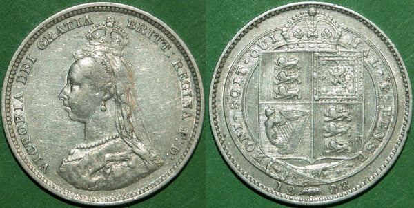 Victoria 1888 over 7 shilling with general wear to both sides and about very fine. The price is £12.