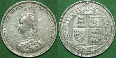 Victoria 1888 over 7 shilling with general wear to both sides and about very fine. The price is £12.