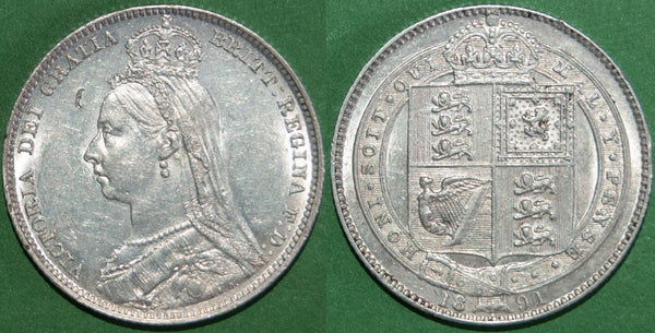 Victoria 1891 Jubilee head shilling with only minimal wear, but a small dig in the obverse field. The grade is better than extremely fine and the price is £65.