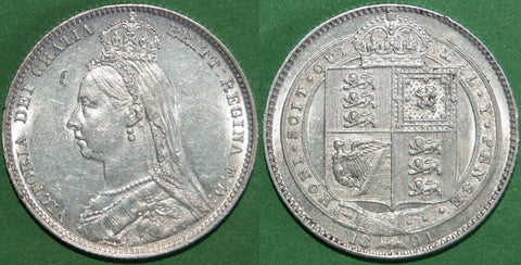 Victoria 1891 Jubilee head shilling with only minimal wear, but a small dig in the obverse field. The grade is better than extremely fine and the price is £65.