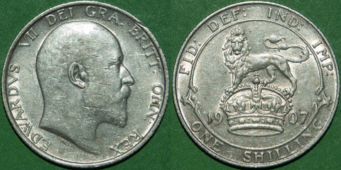 A 1907 shilling with marks to the obverse. Nearly extremely fine, but with issues. The reverse is better. The price is £40.