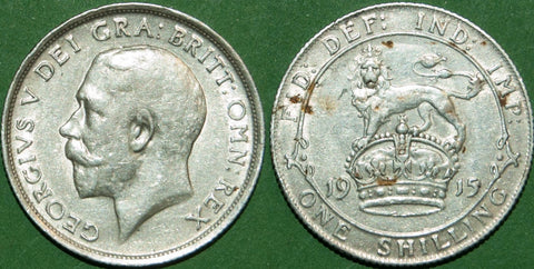 A 1915 first coinage shilling with light wear and some deposits on the reverse. Almost extremely fine and the price is £22.