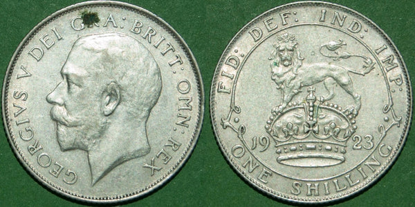 A 1923 shilling with minimal wear and an obverse verdigris spot above the head. Grades extremely fine and the price is £35.
