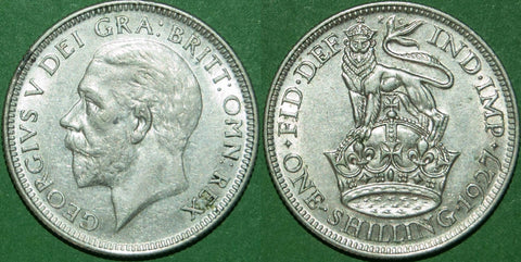 A 1927 fourth coinage shilling with a trace of rub to the high points of both sides. grades good extremely fine and the price is £30.