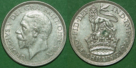 A 1929 shilling with a little wear and marks in the reverse field with a verdigris spot on the crown. Grades extremely fine and the price is £12.