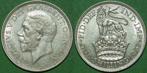 A 1931 shilling, practically as struck. The price is £50.