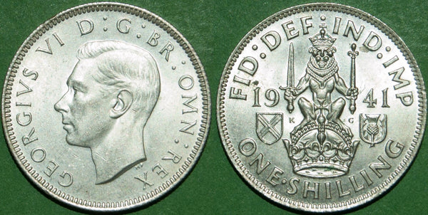 A 19441S shilling, practically as struck, with a small spot on the reverse. The price is £22.