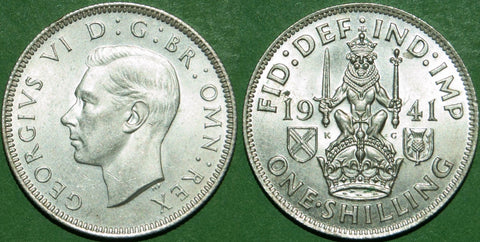 A 19441S shilling, practically as struck, with a small spot on the reverse. The price is £22.