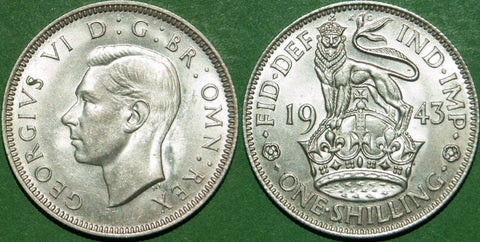 A 1943E shilling, practically as struck, with a small spot on the obverse S. The price is £15.