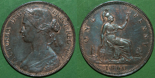 A Victoria 1860 toothed border bun head penny. 