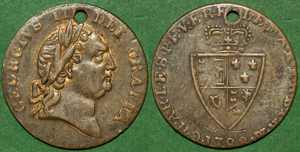 Image of a half guinea gaming counter.